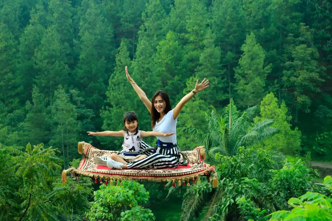 mom and son with green scenery