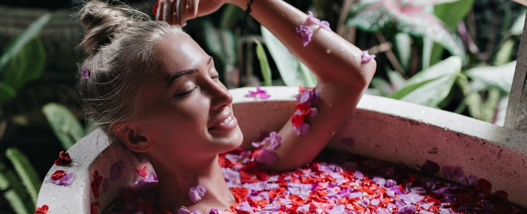 Woman Enjoying Flower Bath After Spa