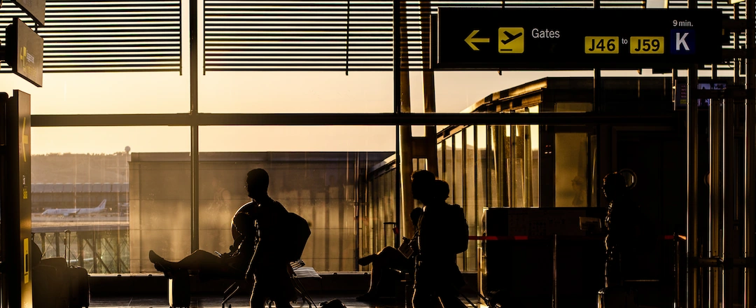People Walking in Airport Terminal