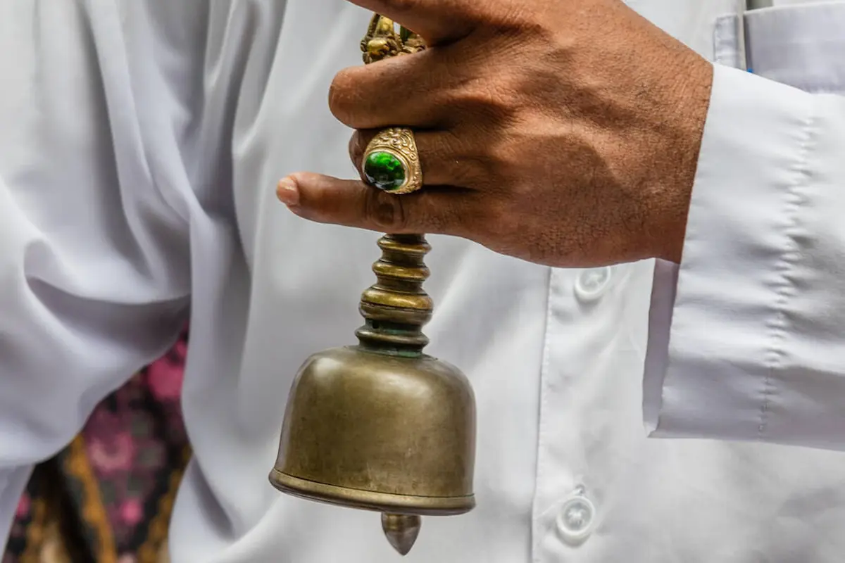 Genta Bell Hold By Balinese Priest