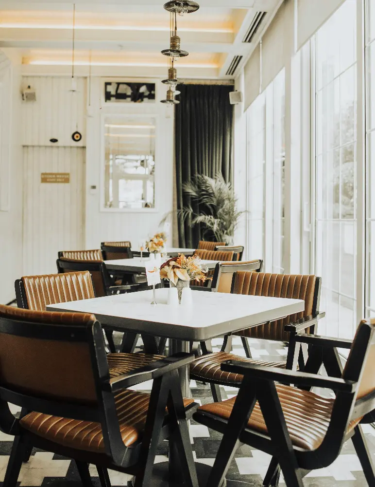 Elegant dining space with leather chairs