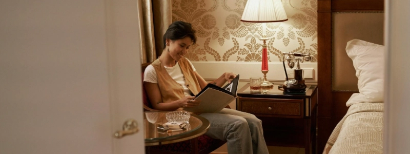 A lady is reading a book