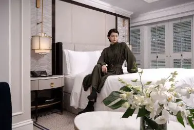 woman staycation on bed