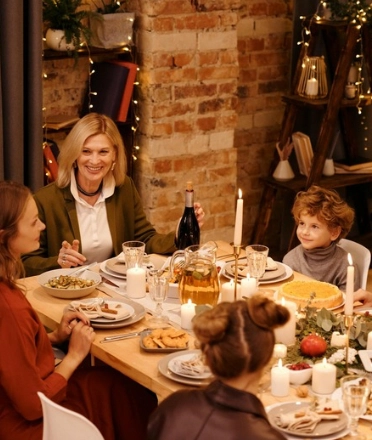 Family gather on a table