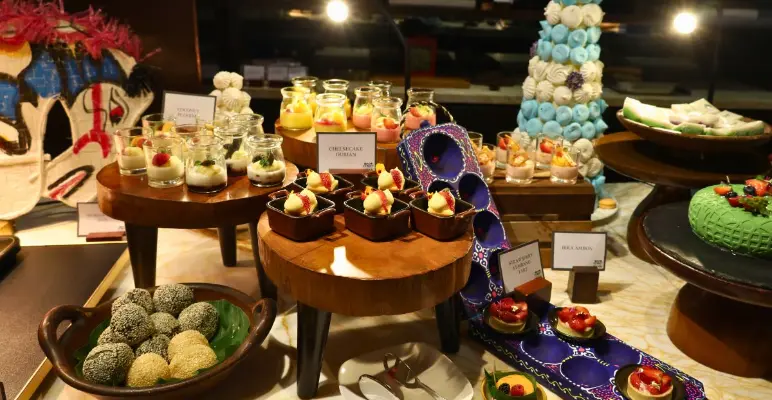 Colorful dessert and local food selection displayed buffet-style at Dago Street Kitchen.