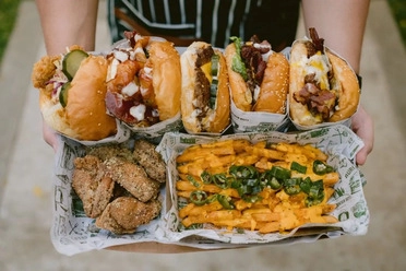 burgers, french fries, and chicken wings 