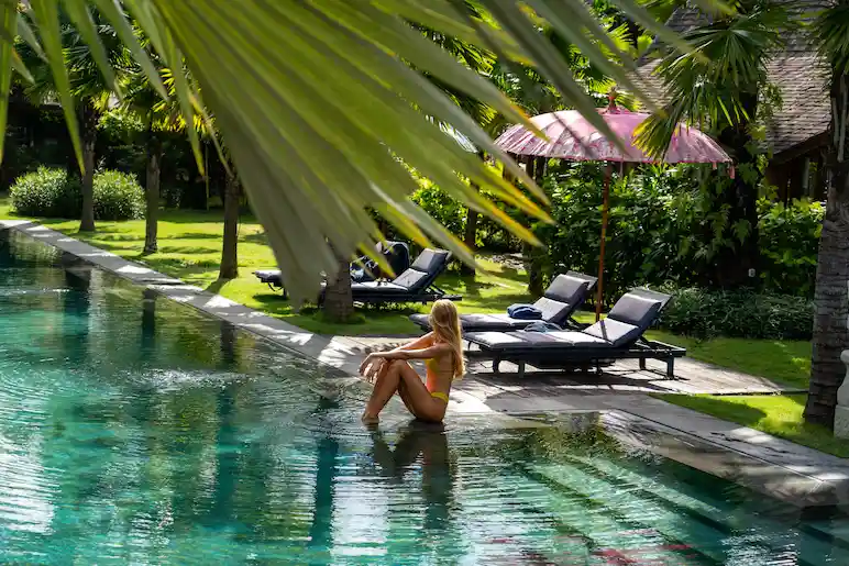 woman in the side of the pool